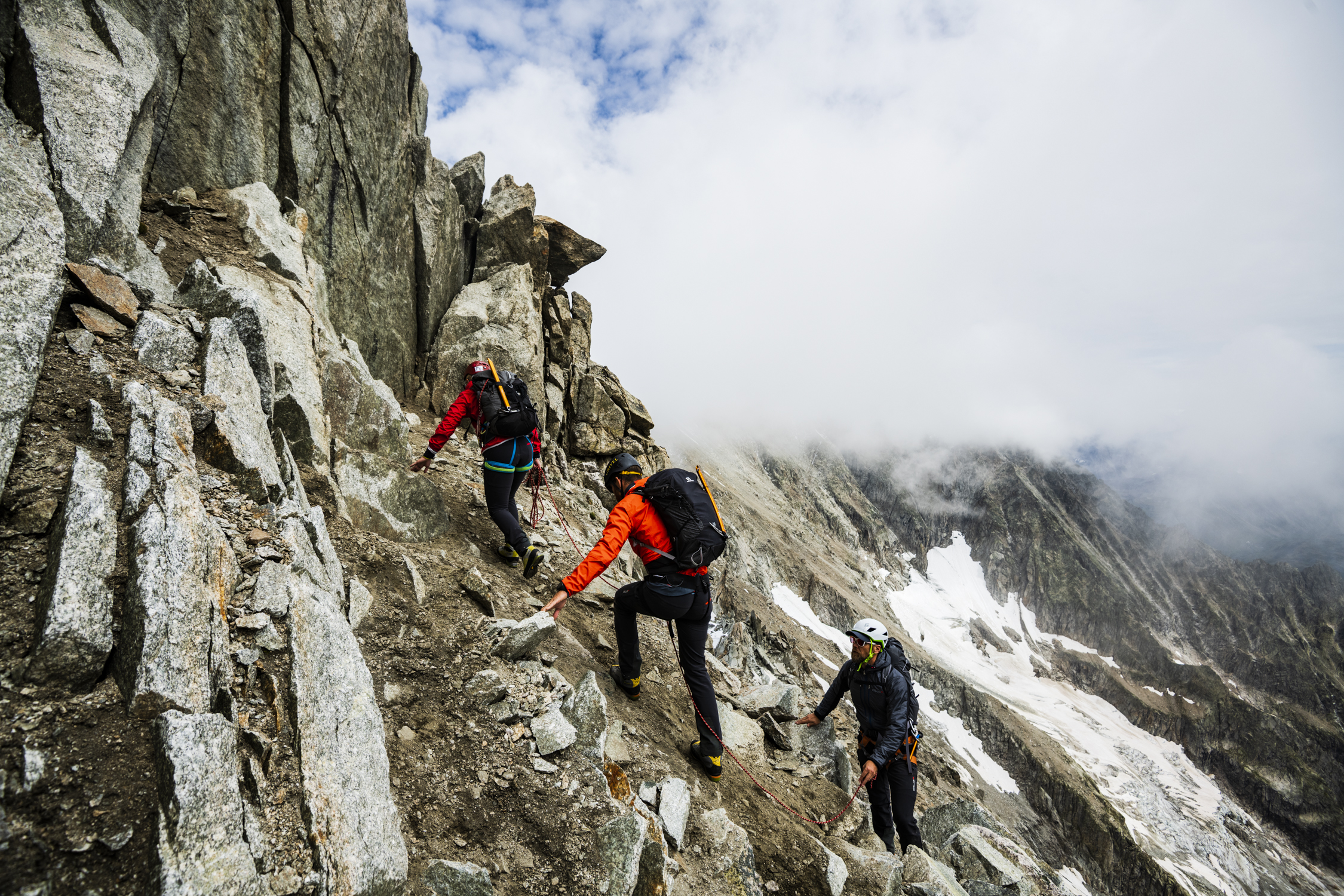 People mountain climbing